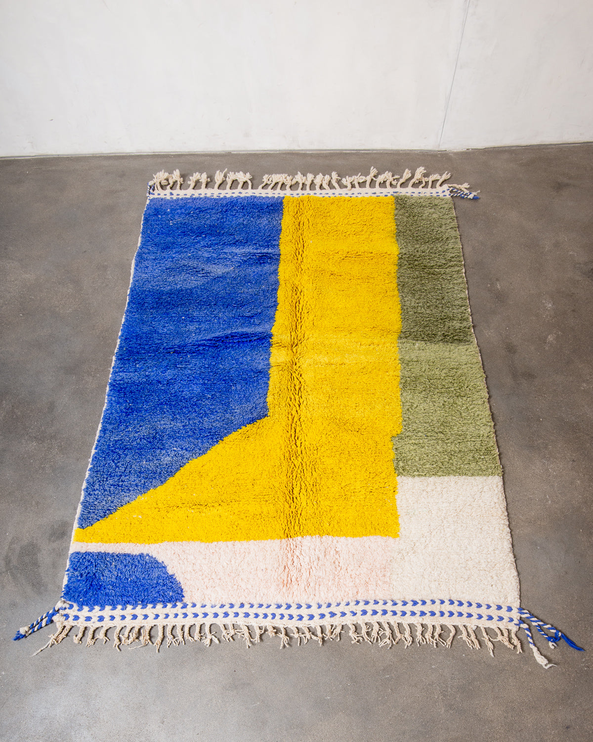 Modern, designer, handcrafted Berber rug from Morocco. Beniourain carpet with beautiful colours and patterns and fluffy wool texture.